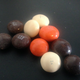 Image for article titled Hell Candy Face-Off: Pumpkin Spice Latte M&Ms Versus the Dreaded Dutch Ficorice